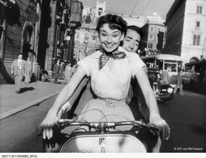 Audrey Hepburn und Gergory Peck auf einem Motorroller