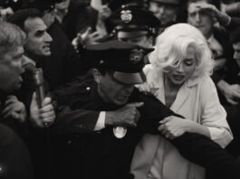 Marilyn Monroe und Polizist in Menschenmenge