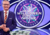 Günther Jauch mit Geld bei "Wer wird Millionär"
