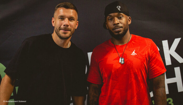 Lukas Podolski und Reece Moore