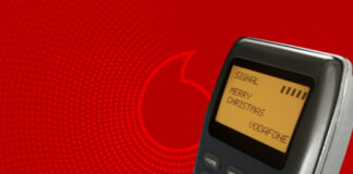 SMS vor Vodafone-Hintergrund