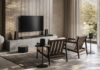 Sessel vor Fernseher mit Loewe Lautsprechern