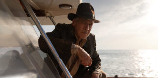Harrison Ford als Indiana Jones auf einem Boot