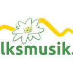 Neues Logo von Volksmusik.tv mit einer Blüte und angedeuteten Bergen über dem Schriftzug.
