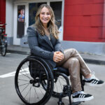 Kristina Vogel vor einer "Unter Uns"-Kulisse