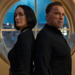 "Fubar", Carrie Ann Moss, Arnold Schwarzenegger
