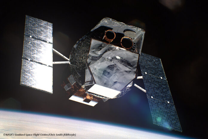 df_swift_render Ein Renderbild eines Satelliten, im Hintergrund ist die Erde zu sehen.